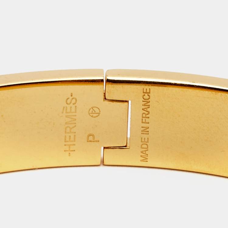 Pre Owned Hermes Clic H Orange Enamel Gold Plated Bracelet