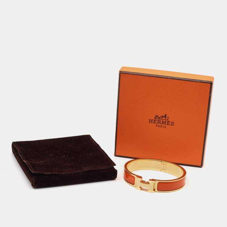 Pre Owned Hermes Clic H Orange Enamel Gold Plated Bracelet