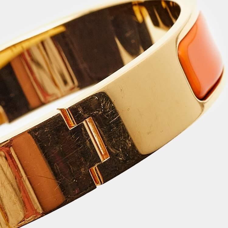 Pre Owned Hermes Clic H Orange Enamel Gold Plated Bracelet