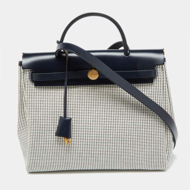 Pre Owned Hermès Ecru Blanc Noir/Bleu Indigo Vache Hunter/Toile Quadrille Viking Leather Herbag Zip Retourne 31 Bag