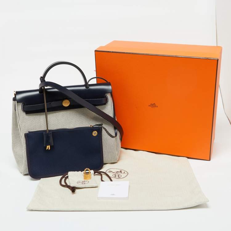 Pre Owned Hermès Ecru Blanc Noir/Bleu Indigo Vache Hunter/Toile Quadrille Viking Leather Herbag Zip Retourne 31 Bag