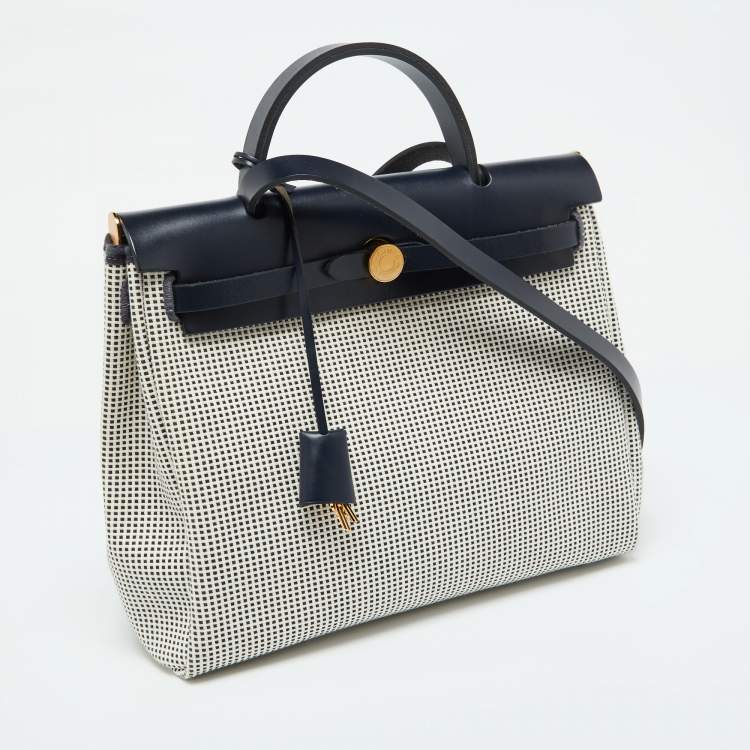 Pre Owned Hermès Ecru Blanc Noir/Bleu Indigo Vache Hunter/Toile Quadrille Viking Leather Herbag Zip Retourne 31 Bag