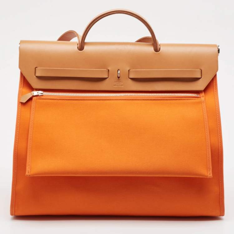 Pre Owned Hermes Orange/Natural Toile and Vache Hunter Leather Herbag Zip 39 Bag