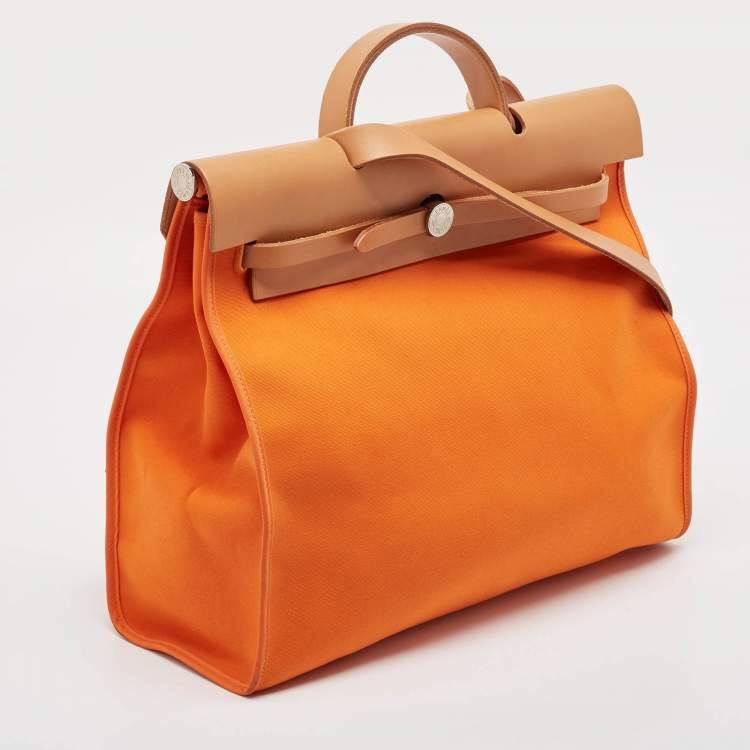 Pre Owned Hermes Orange/Natural Toile and Vache Hunter Leather Herbag Zip 39 Bag