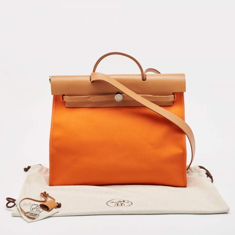 Pre Owned Hermes Orange/Natural Toile and Vache Hunter Leather Herbag Zip 39 Bag