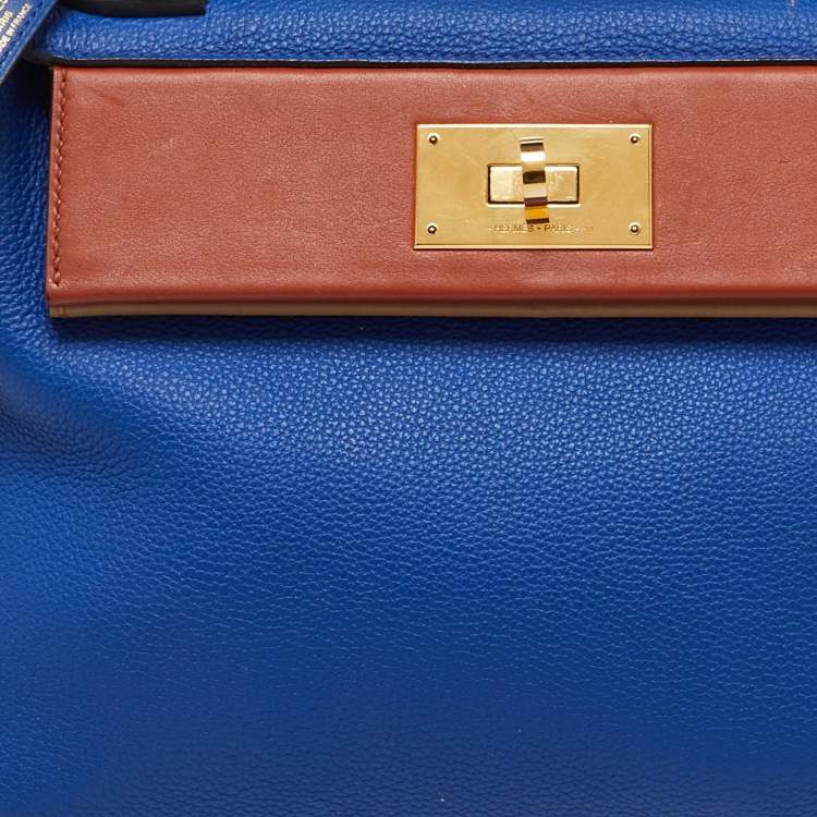 Pre Owned Hermes Blue Royal/Tabac Camel/Fauve Evercolor and Swift Leather Gold Finish 24/24 29 Bag