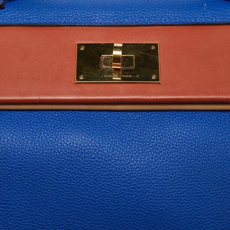 Pre Owned Hermes Blue Royal/Tabac Camel/Fauve Evercolor and Swift Leather Gold Finish 24/24 29 Bag