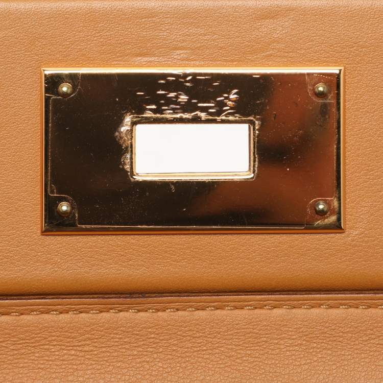 Pre Owned Hermes Jaune Ambre Togo and Swift Leather Gold Tone Finish 24/24 29 Bag