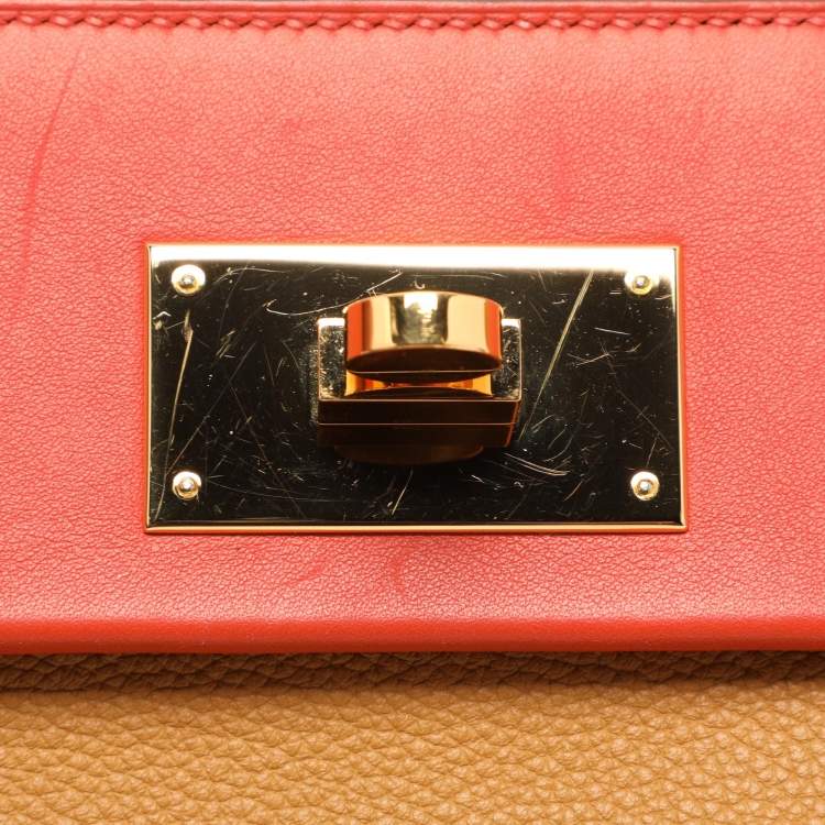 Pre Owned Hermes Jaune Ambre Togo and Swift Leather Gold Tone Finish 24/24 29 Bag