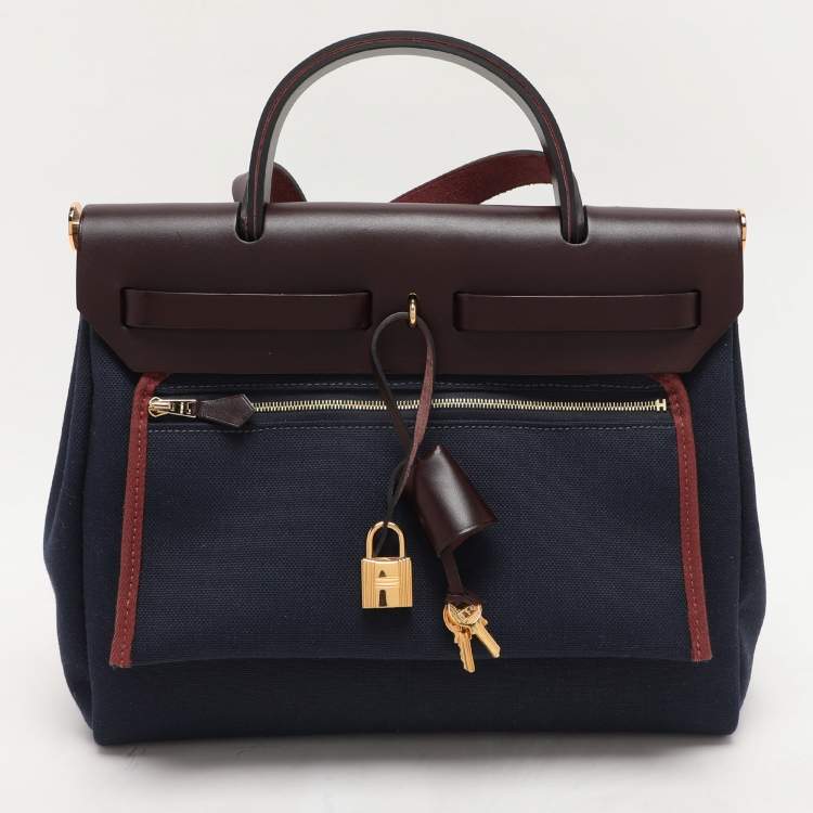 Pre Owned Hermès Navy Blue/Brown Toile Canvas and Leather Herbag Zip 31 Bag