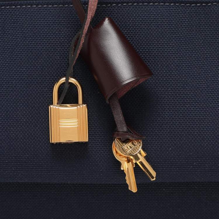 Pre Owned Hermès Navy Blue/Brown Toile Canvas and Leather Herbag Zip 31 Bag