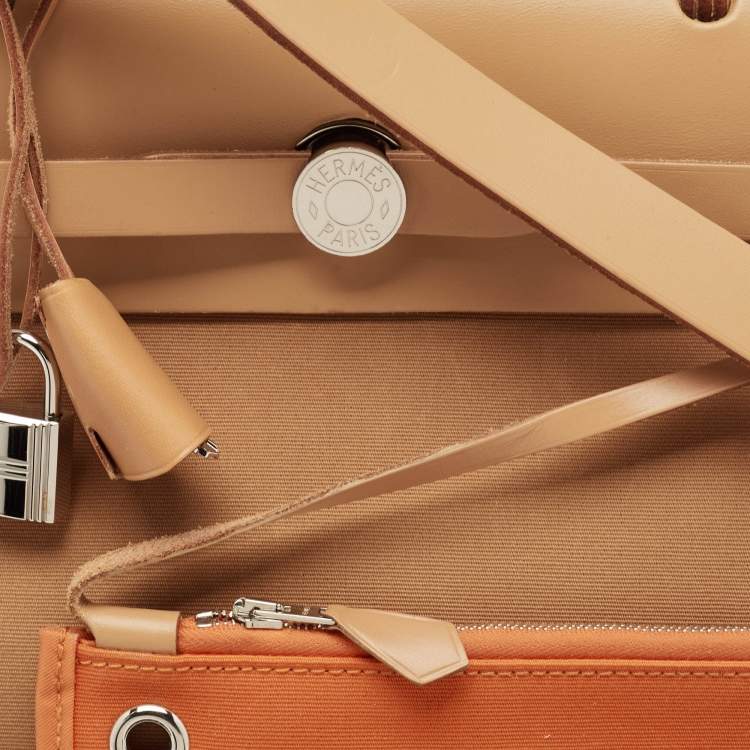 Pre Owned Hermes Dune/Naturel Sable/Orange Toile H and Vache Hunter Herbag Zip 31 Bag