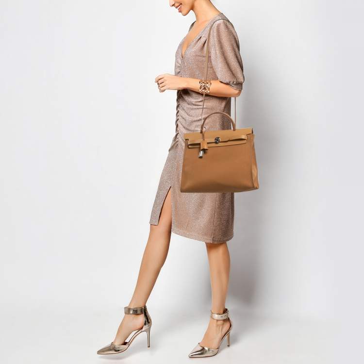 Pre Owned Hermes Dune/Naturel Sable/Orange Toile H and Vache Hunter Herbag Zip 31 Bag