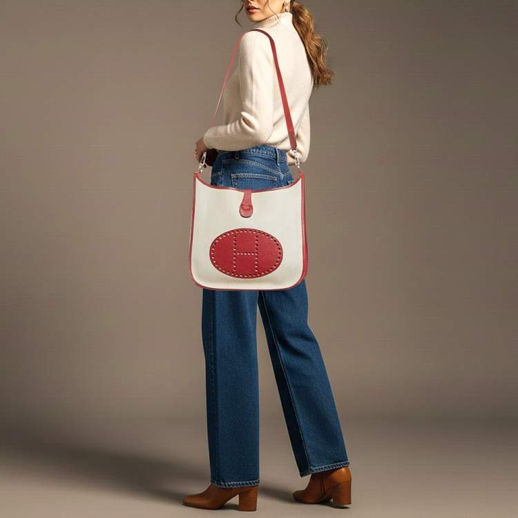 Pre Owned Hermes Evelyne I GM Ecru/Rouge Coated Canvas and Leather Shoulder Bag