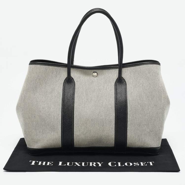 Pre Owned Hermès Ecru/Noir Toile and Buffalo Skipper Leather Garden Party 36 Bag