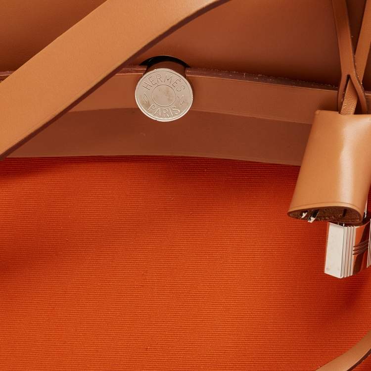 Pre Owned Hermès Orange/Natural Toile and Vache Hunter Herbag Zip 39 Bag
