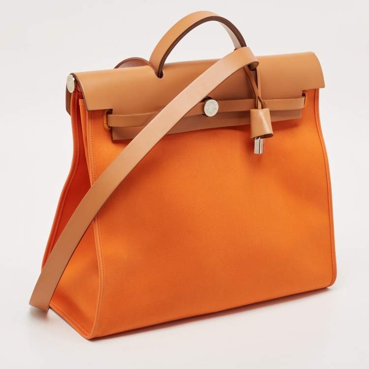 Pre Owned Hermès Orange/Natural Toile and Vache Hunter Herbag Zip 39 Bag