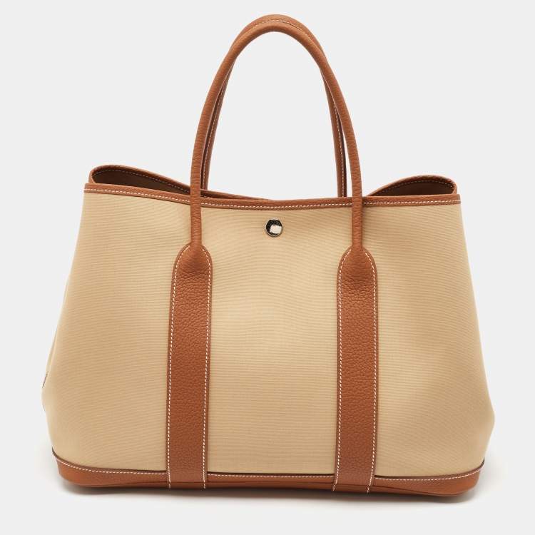Pre Owned Hermes Trench/Gold Toile H and Negonda Leather Garden Party 36 Bag