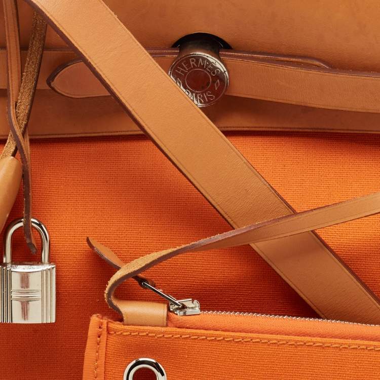 Pre Owned Hermes Orange/Natural Toile and Vache Hunter Herbag 31 Bag