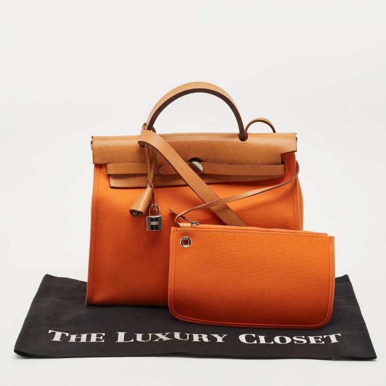 Pre Owned Hermes Orange/Natural Toile and Vache Hunter Herbag 31 Bag