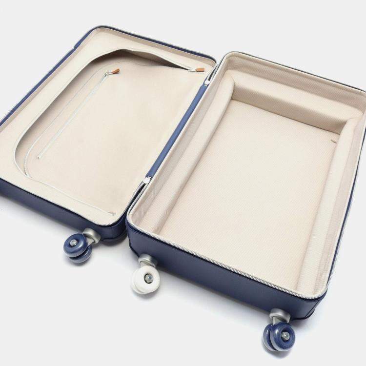 مملوكة مسبقًا Hermes Beige Navy Leather Rolling Mobility Carry Bag