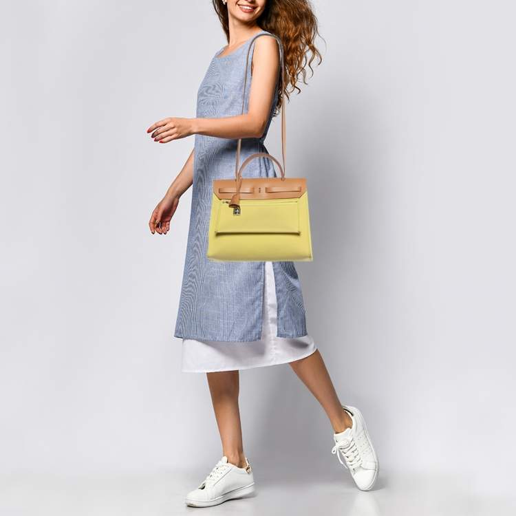 Pre Owned Hermes Soufre/Natural Toile Canvas and Vache Leather Herbag Zip 31 Bag