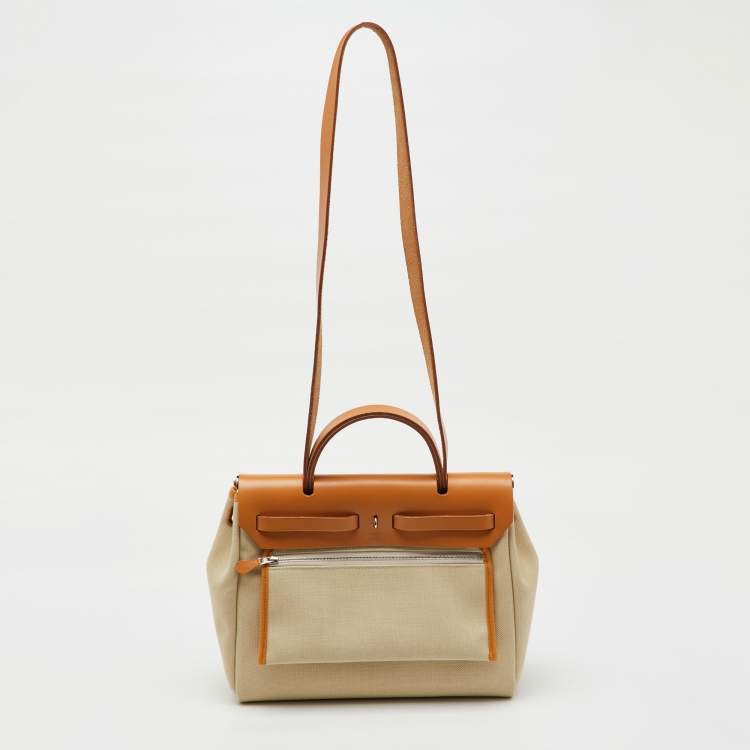 Pre Owned Hermes Ecru/Natural Toile Canvas and Vache Leather Herbag Zip 31 Bag