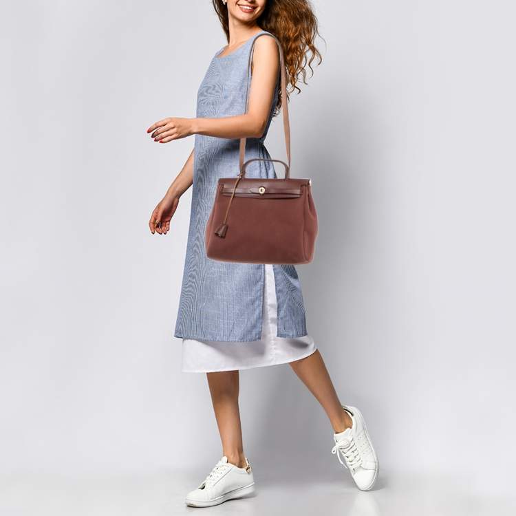 Pre Owned Hermès Rouge H Toile Canvas and Vache Hunter Leather Herbag 31 Bag