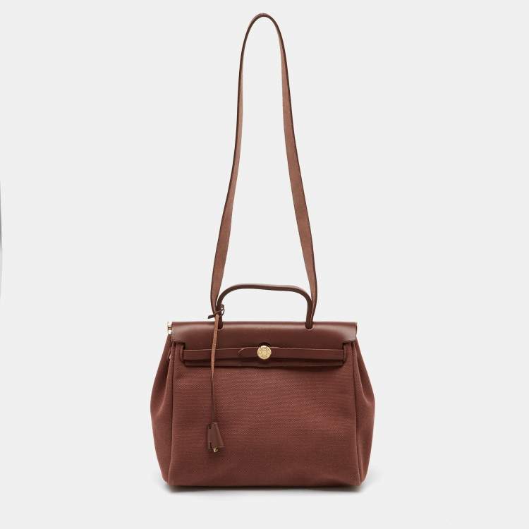 Pre Owned Hermès Rouge H Toile Canvas and Vache Hunter Leather Herbag 31 Bag