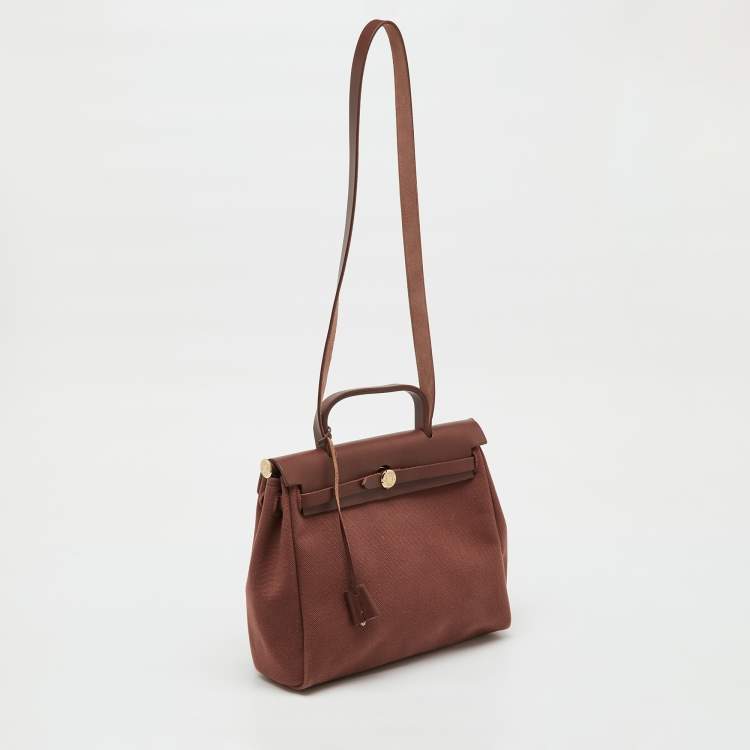 Pre Owned Hermès Rouge H Toile Canvas and Vache Hunter Leather Herbag 31 Bag