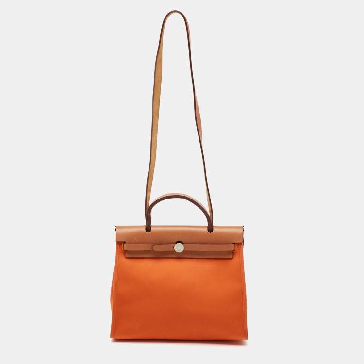 Pre Owned Hermès Orange/Natural Canvas and Vache Hunter Leather Herbag Zip 31 Bag