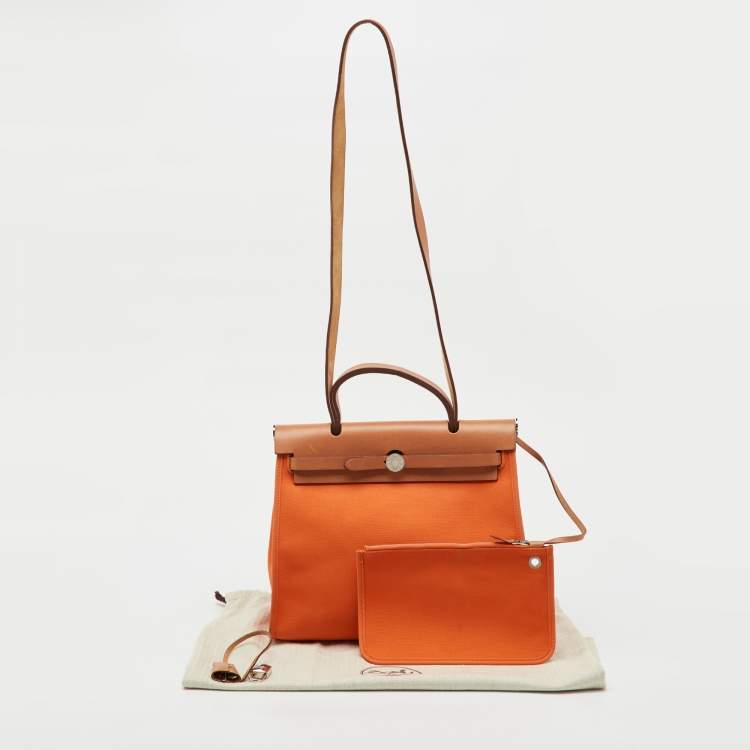 Pre Owned Hermès Orange/Natural Canvas and Vache Hunter Leather Herbag Zip 31 Bag