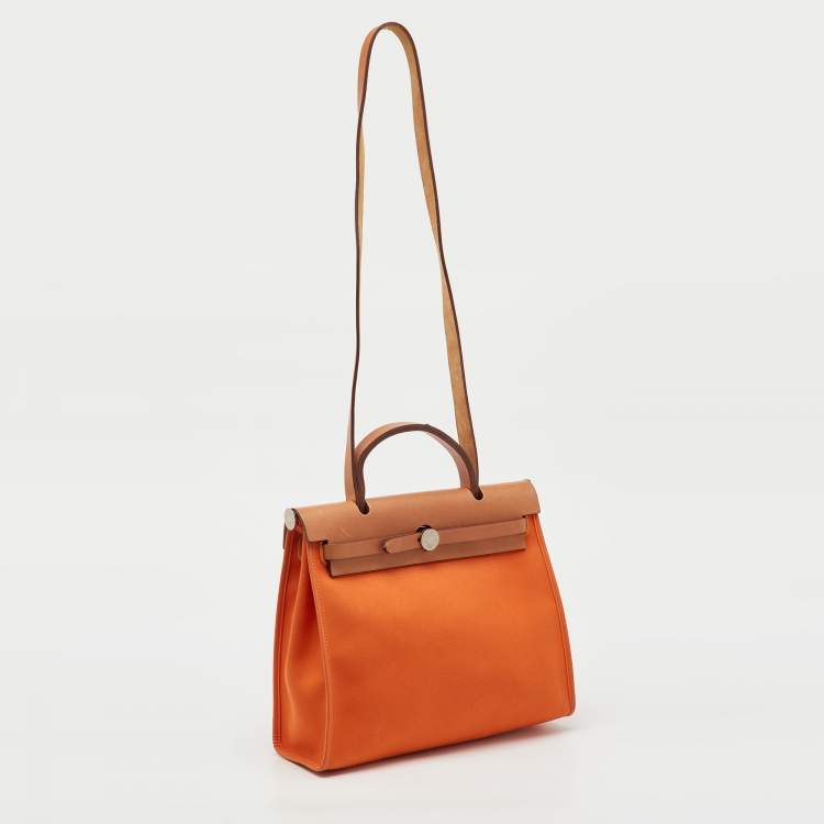 Pre Owned Hermès Orange/Natural Canvas and Vache Hunter Leather Herbag Zip 31 Bag