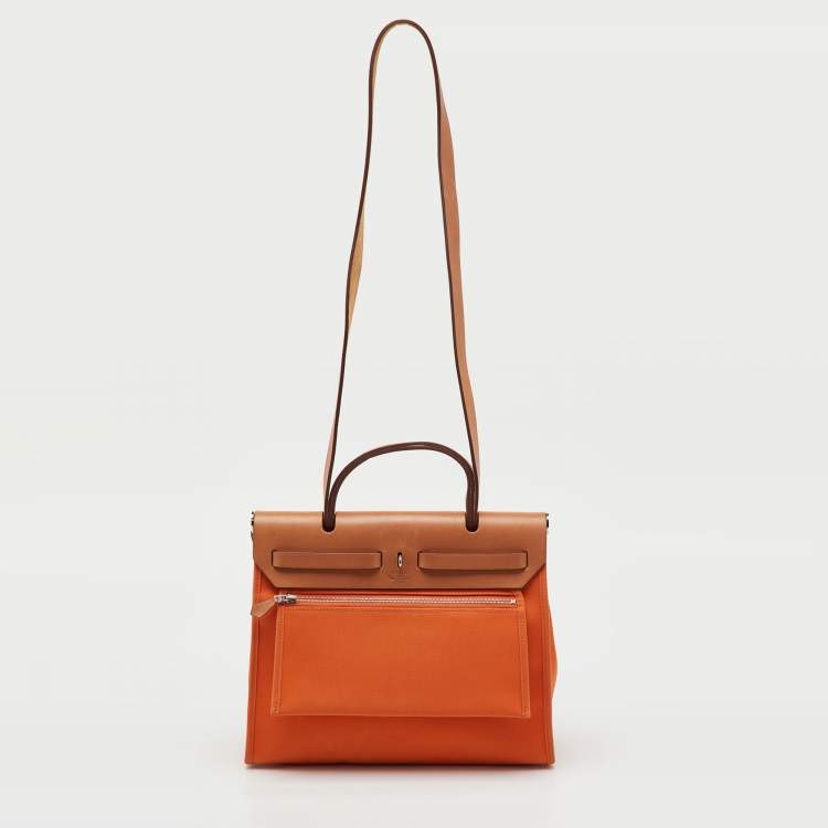 Pre Owned Hermès Orange/Natural Canvas and Vache Hunter Leather Herbag Zip 31 Bag