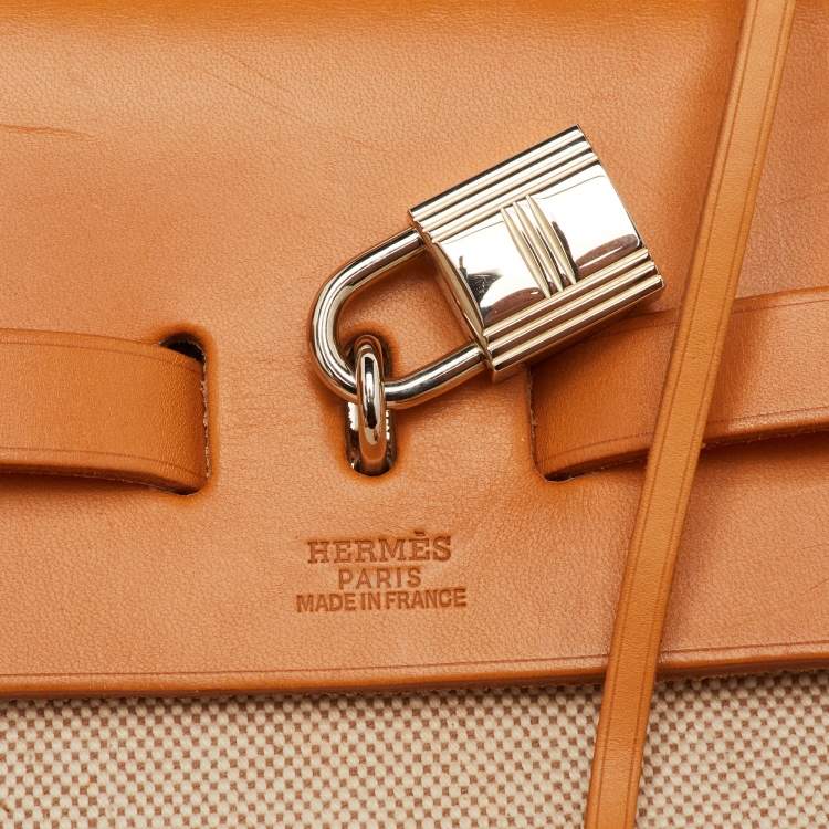Pre Owned حقيبة ظهر هيرمس إكرو/طبيعي توليه كانفاس وجلد فاش 2 في 1