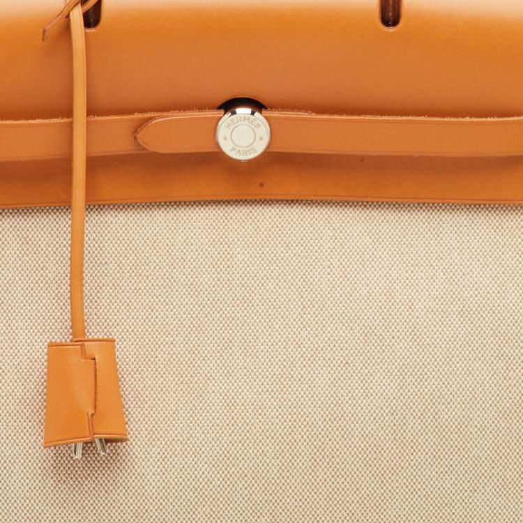 Pre Owned حقيبة ظهر هيرمس إكرو/طبيعي توليه كانفاس وجلد فاش 2 في 1