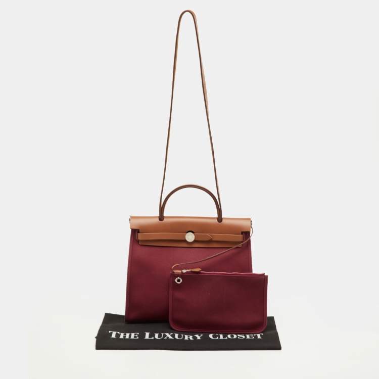 Pre Owned Hermes Herbag Zip 31 Ruby/Fauve Toile and Vache Hunter Top Handle Bag