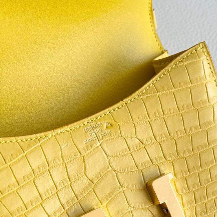 Pre Owned Hermes Micro Constance 14 matte crocodile Marigold yellow with gold hardware