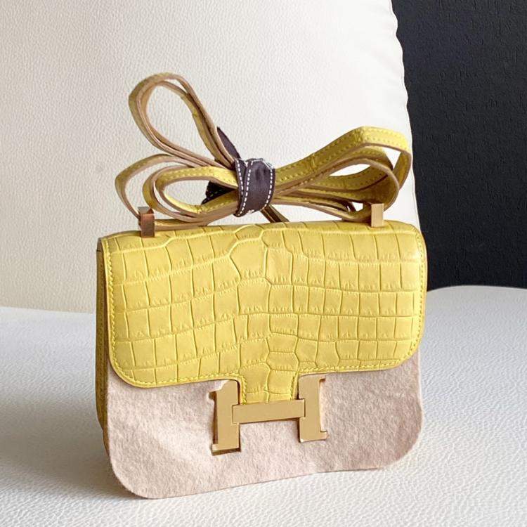 Pre Owned Hermes Micro Constance 14 matte crocodile Marigold yellow with gold hardware