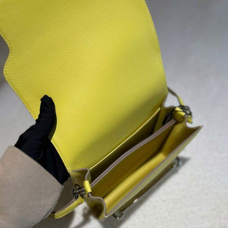 Pre Owned Hermes Mini Roulis lemon yellow with palladium hardware