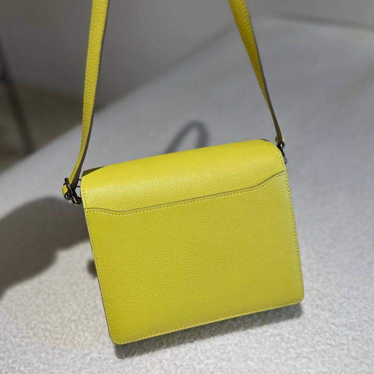 Pre Owned Hermes Mini Roulis lemon yellow with palladium hardware
