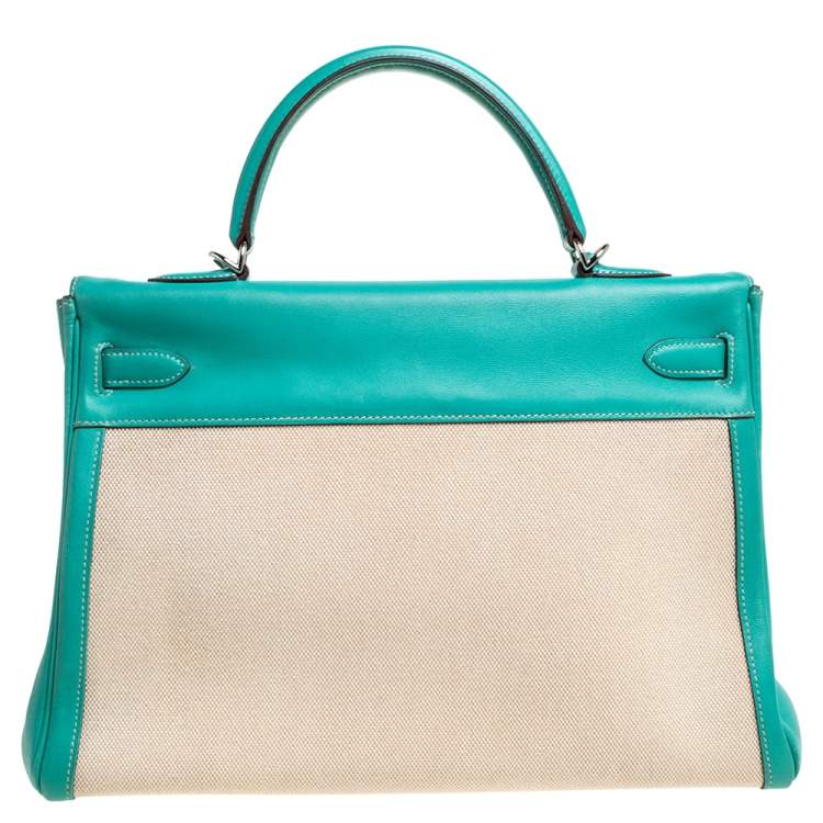 Pre Owned Hermes Lagon Toile and Swift Leather Palladium Hardware Kelly Retourne 35 Bag
