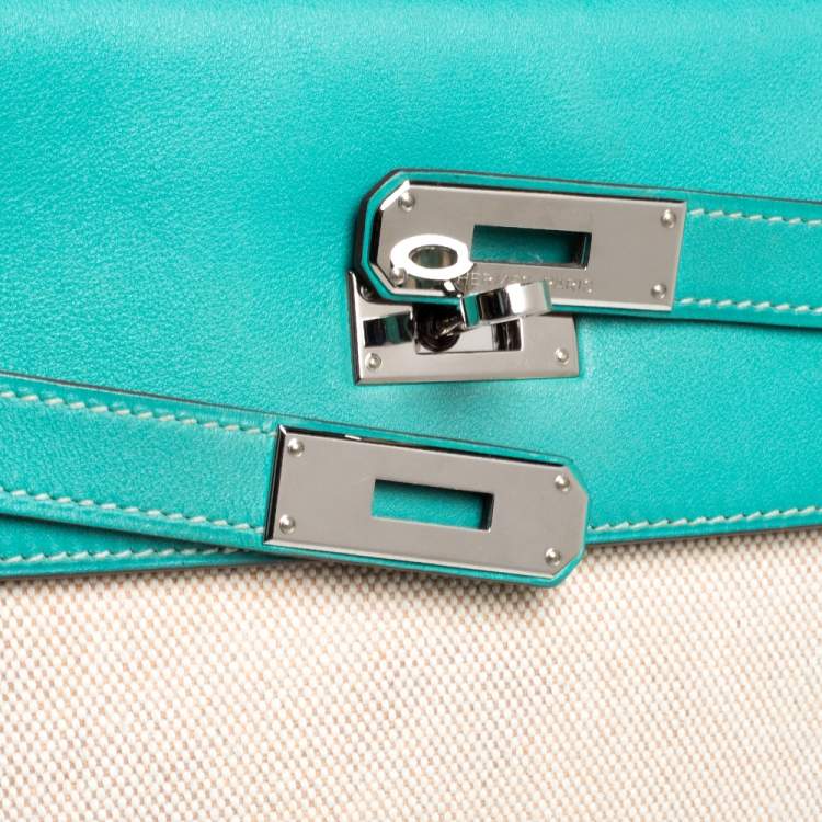 Pre Owned Hermes Lagon Toile and Swift Leather Palladium Hardware Kelly Retourne 35 Bag