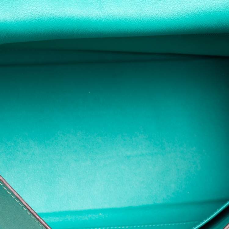 Pre Owned Hermes Lagon Toile and Swift Leather Palladium Hardware Kelly Retourne 35 Bag
