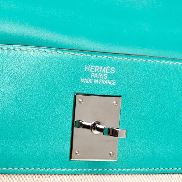 Pre Owned Hermes Lagon Toile and Swift Leather Palladium Hardware Kelly Retourne 35 Bag