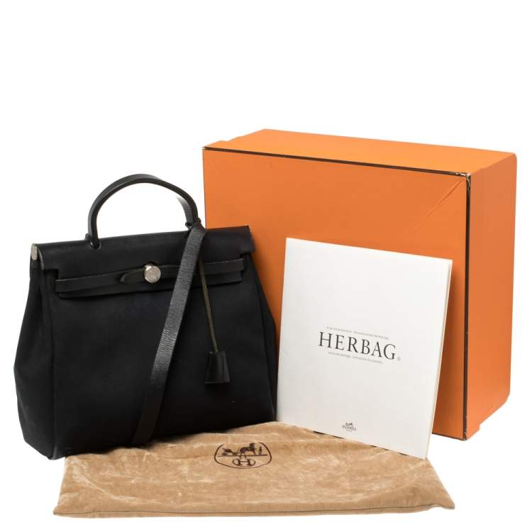 مملوكة مسبقًا Hermès Black Canvas and Leather Herbag Zip 31 Bag