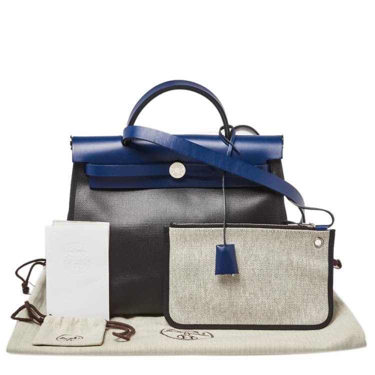 Pre Owned Hermes Black/Blue Sapphire Coated Canvas and Leather Limited Edition Herbag Zip 31 Bag
