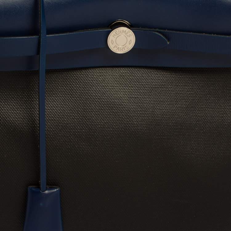 Pre Owned Hermes Black/Blue Sapphire Coated Canvas and Leather Limited Edition Herbag Zip 31 Bag