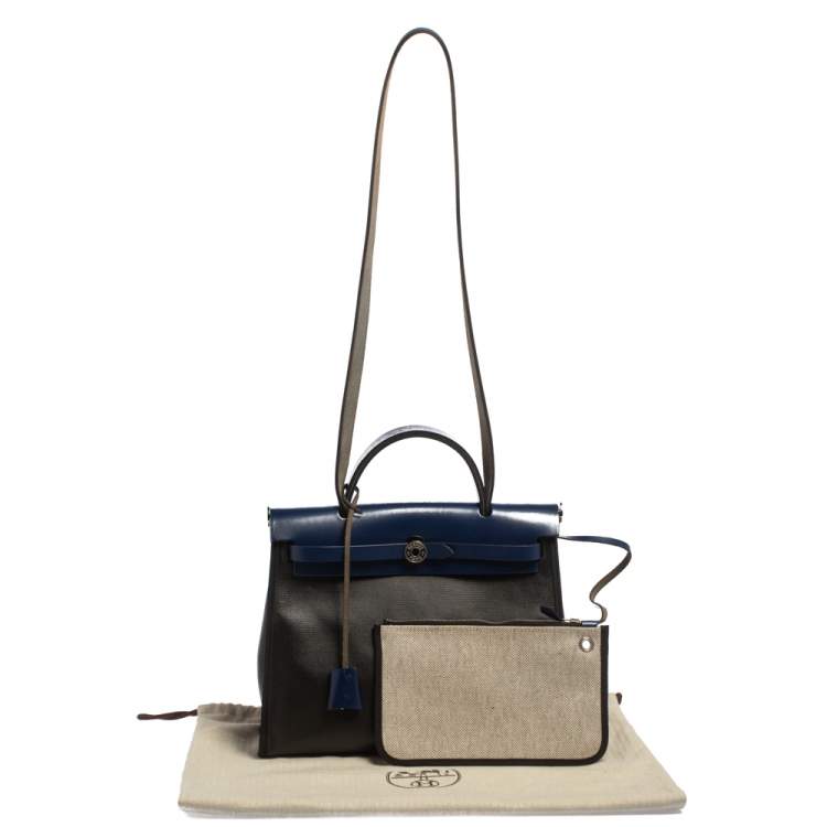 Pre Owned Hermes Black/Blue Sapphire Coated Canvas and Leather Limited Edition Herbag Zip 31 Bag