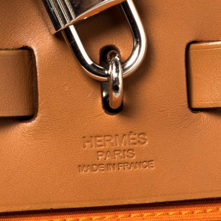 Pre Owned Hermes Orange/Natural Canvas and Leather Herbag Zip 31 Bag